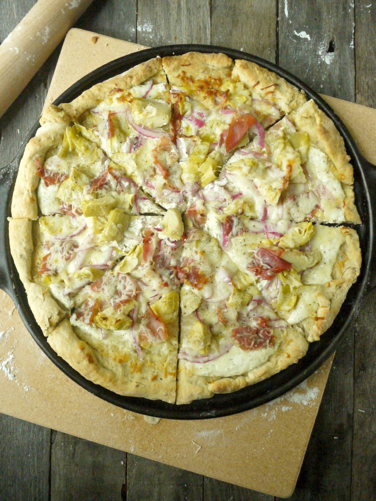 artichoke and prosciutto pizza with yogurt-feta sauce 4