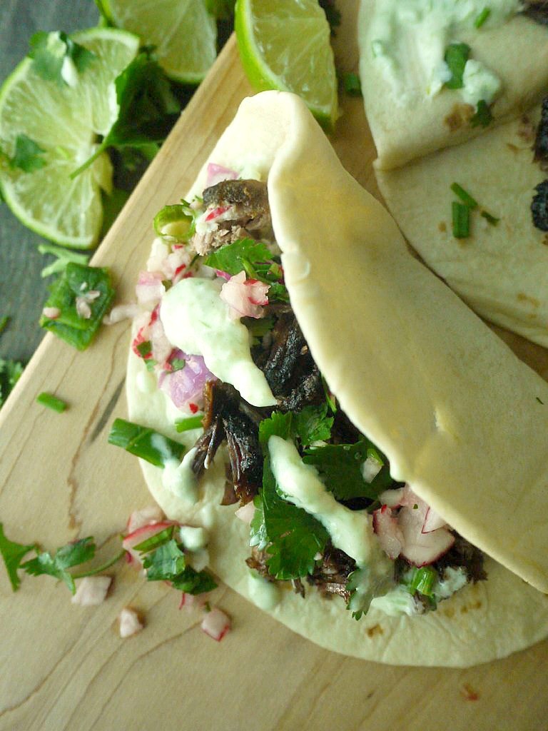 beer braised lamb tacos with chive tzatziki 14