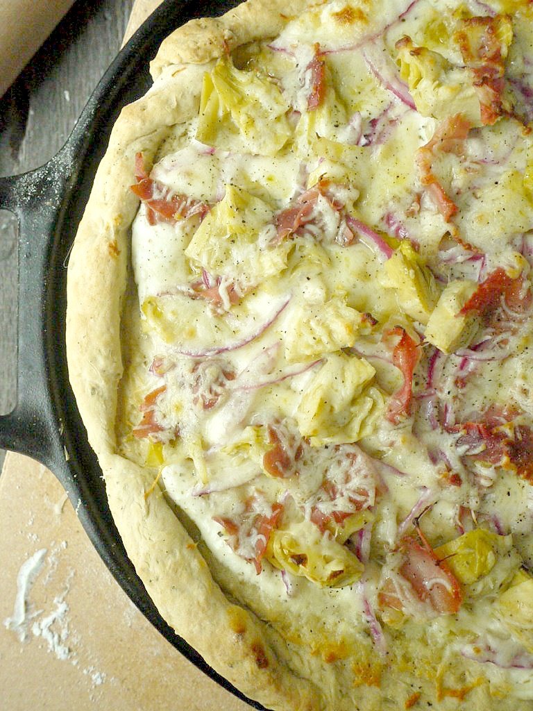 artichoke and prosciutto pizza with yogurt-feta sauce 11