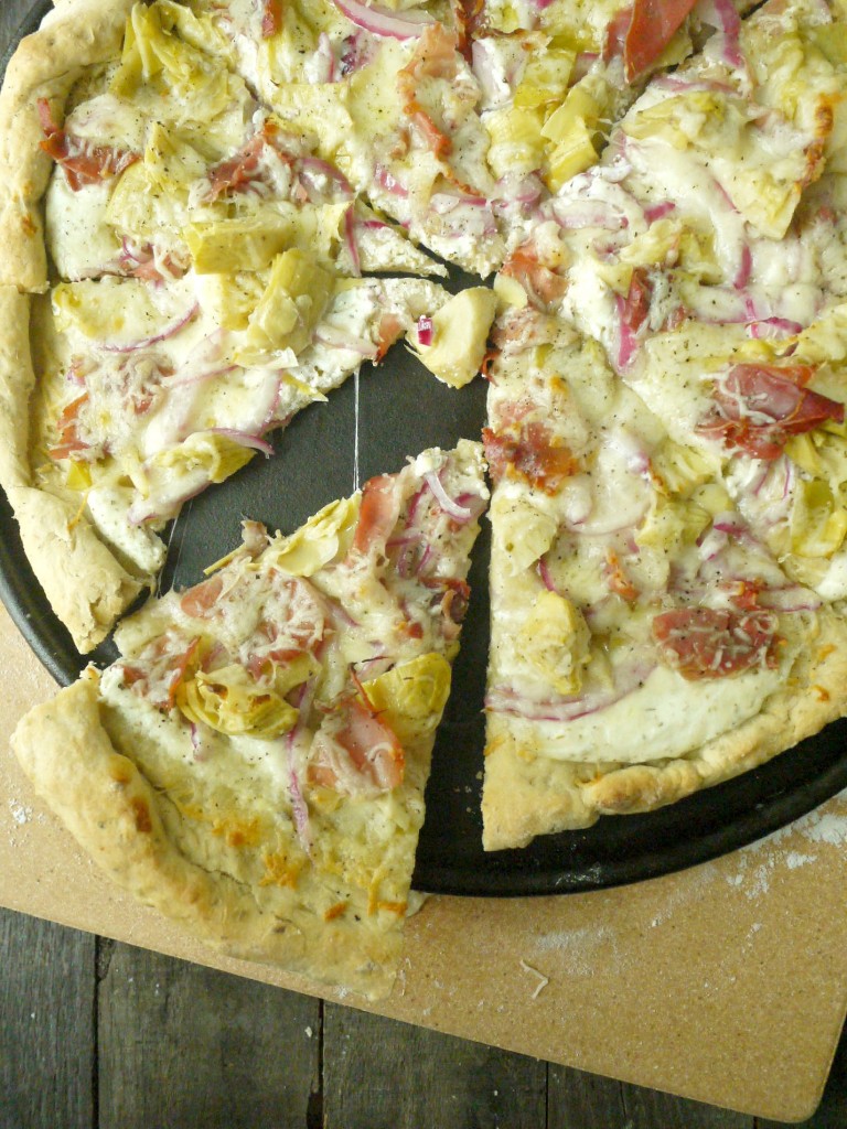 artichoke and prosciutto pizza with yogurt-feta sauce 5
