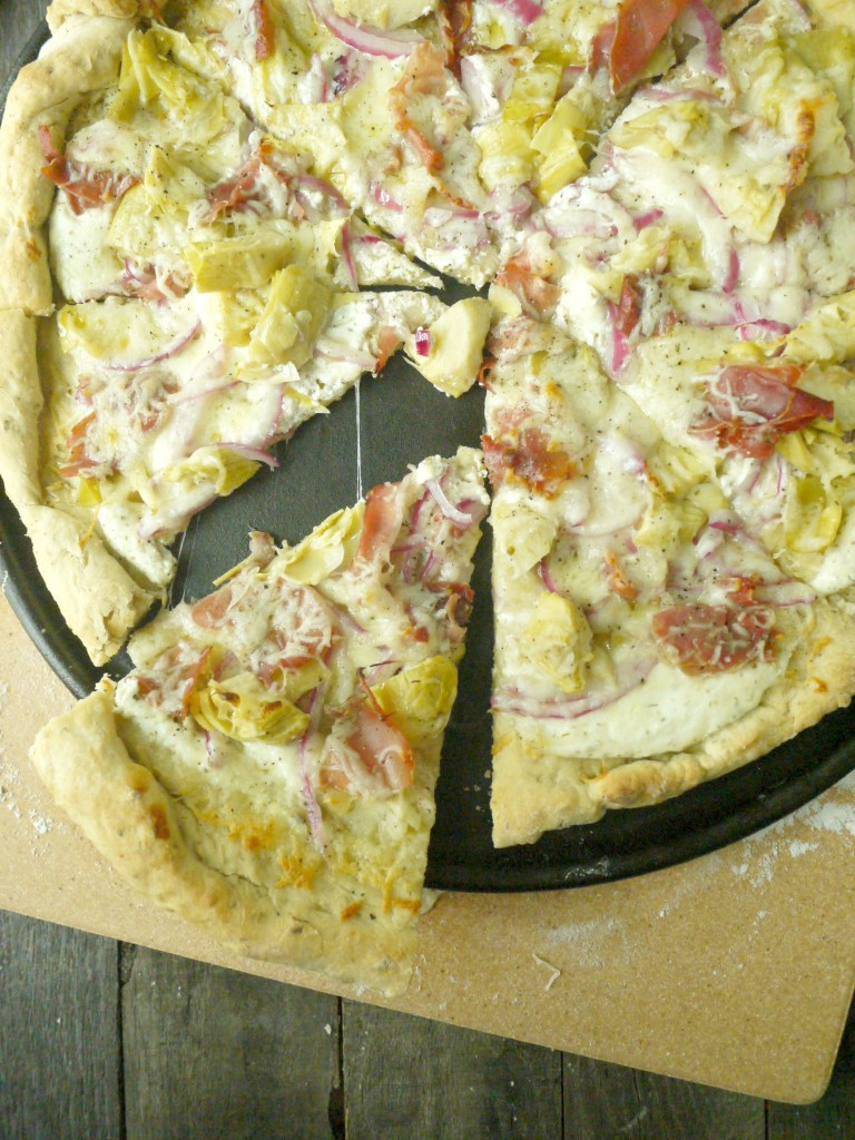 artichoke and prosciutto pizza with yogurt-feta sauce 5